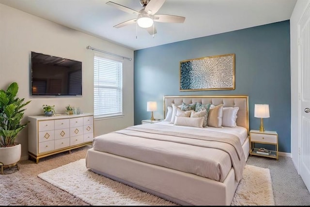 carpeted bedroom featuring ceiling fan