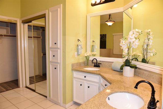 bathroom featuring vanity and tile patterned floors