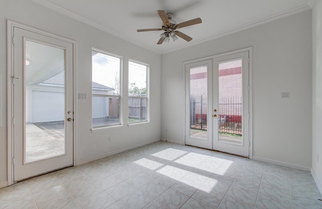 entryway featuring french doors, ceiling fan, and crown molding