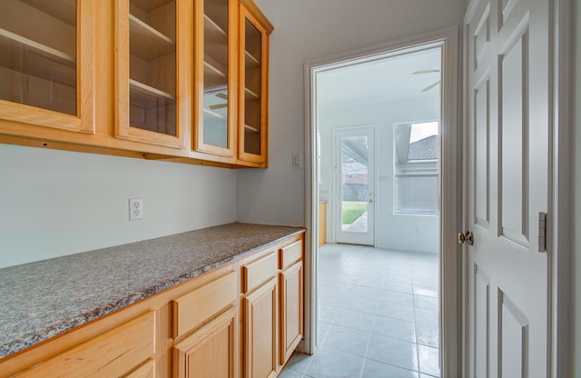 interior space featuring light tile patterned floors