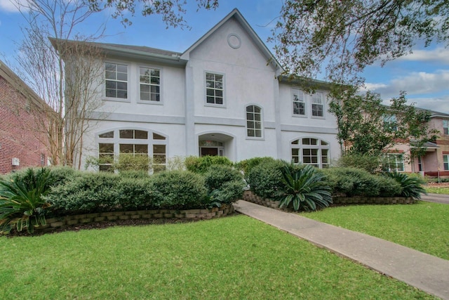 view of front of home with a front yard