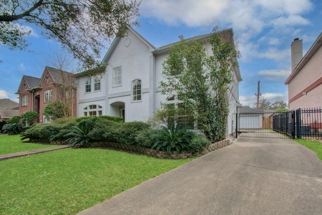 view of front of house with a front lawn