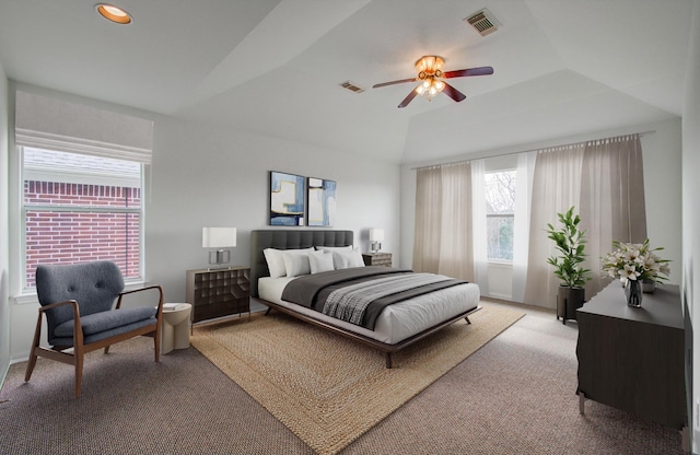 bedroom featuring light carpet, lofted ceiling, and ceiling fan