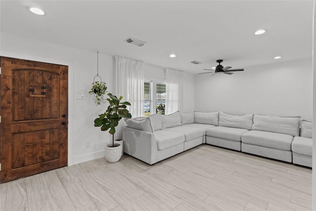 living room with ceiling fan