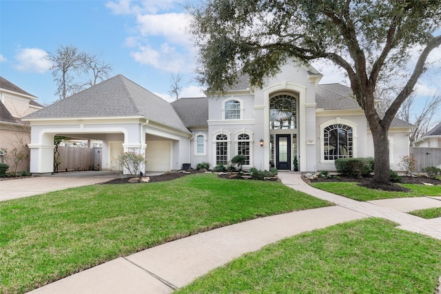 view of front facade featuring a garage and a front yard