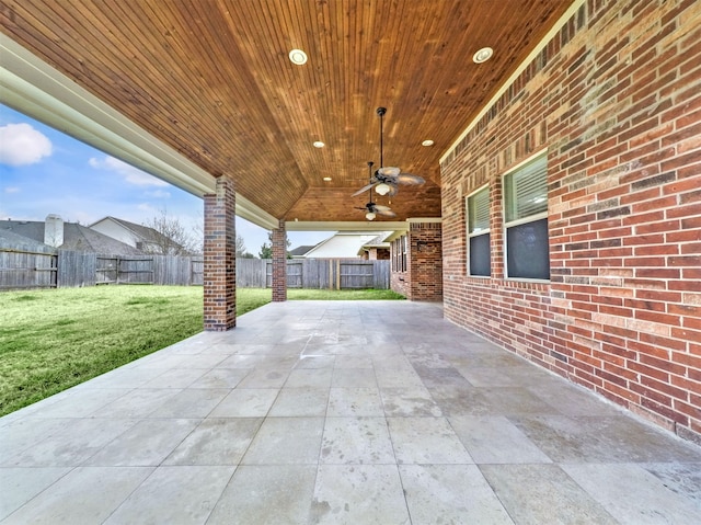 view of patio featuring ceiling fan