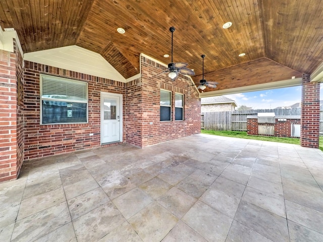 view of patio / terrace with ceiling fan and exterior kitchen