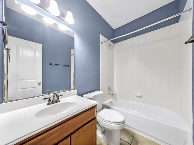 full bathroom featuring washtub / shower combination, vanity, toilet, and tile patterned flooring