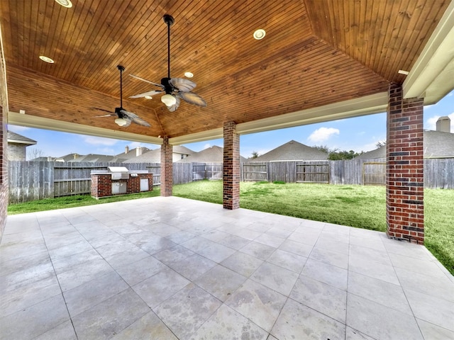 view of patio with grilling area and ceiling fan