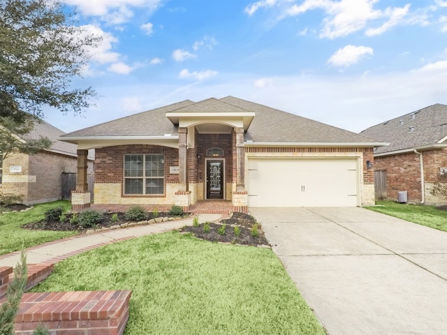 ranch-style house with a garage and a front yard