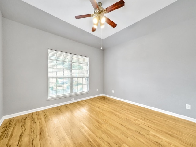 unfurnished room with ceiling fan and wood-type flooring