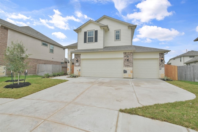 front of property with a garage and a front lawn