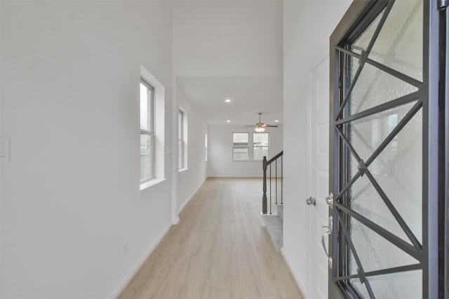 foyer with light hardwood / wood-style floors