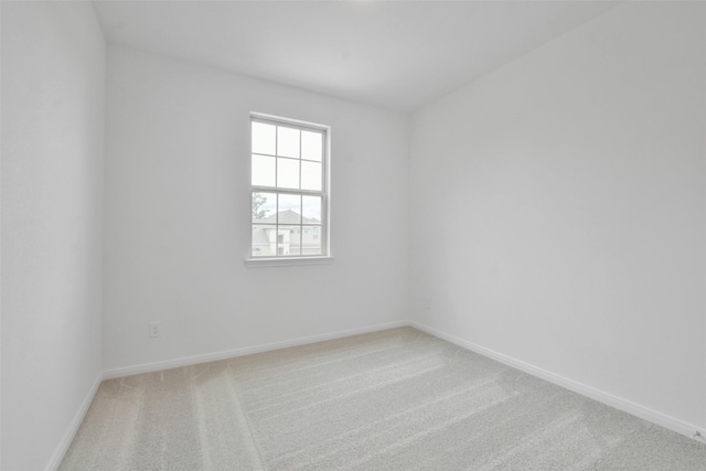 empty room with carpet flooring