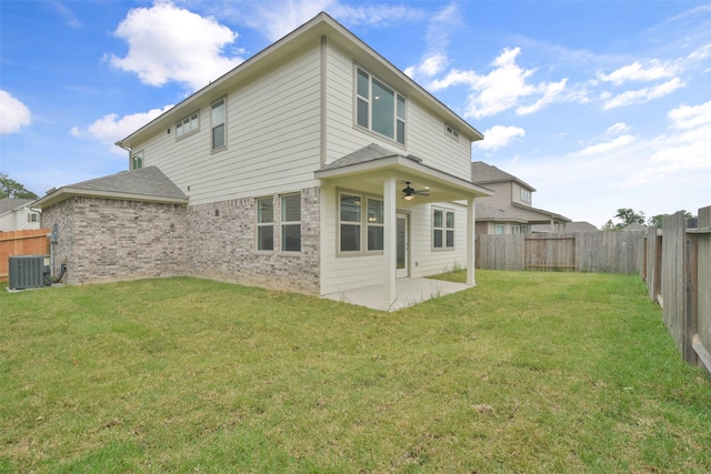 back of house with ceiling fan, a yard, a patio, and central air condition unit