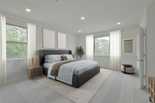 bedroom with light colored carpet