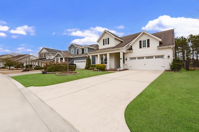 view of front of home with a garage, a front yard, and a porch