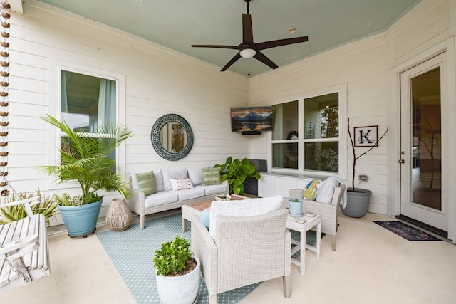 view of patio featuring an outdoor hangout area and ceiling fan