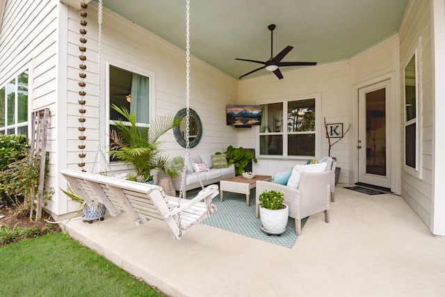 view of patio with an outdoor living space and ceiling fan