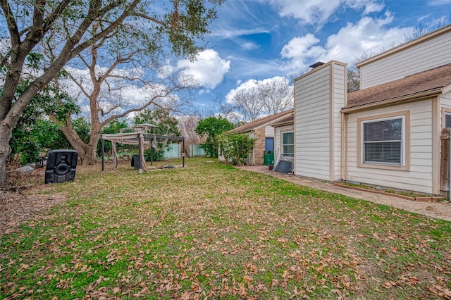 view of yard with a pergola