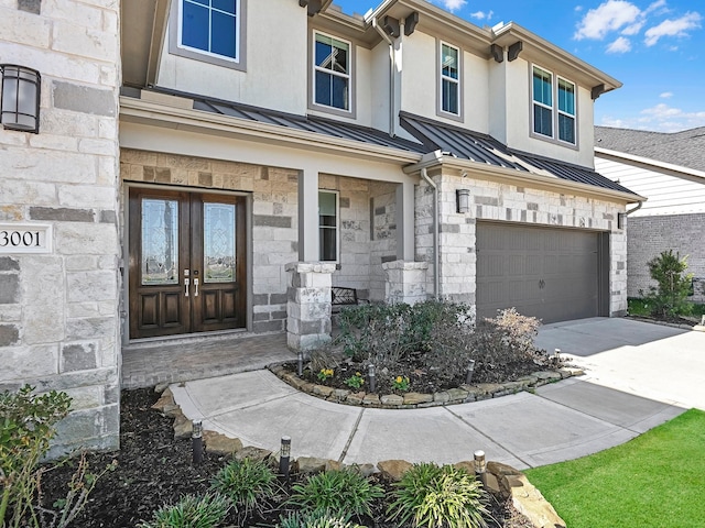 view of front of house featuring french doors and a garage