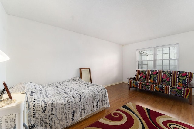 bedroom featuring wood-type flooring