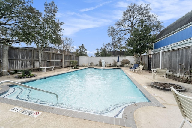 view of pool with a patio