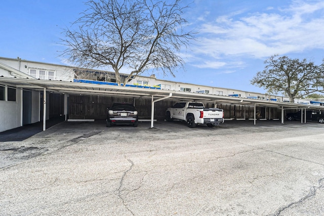 view of parking featuring a carport