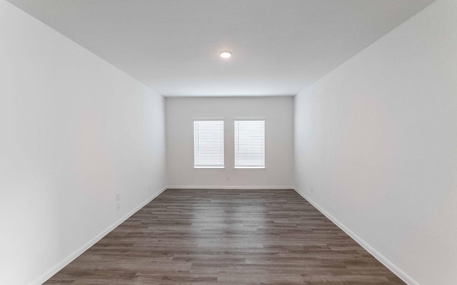 10775 Sora Dr, Willis, TX 77378 - spare room with recessed lighting, baseboards, and dark wood finished floors