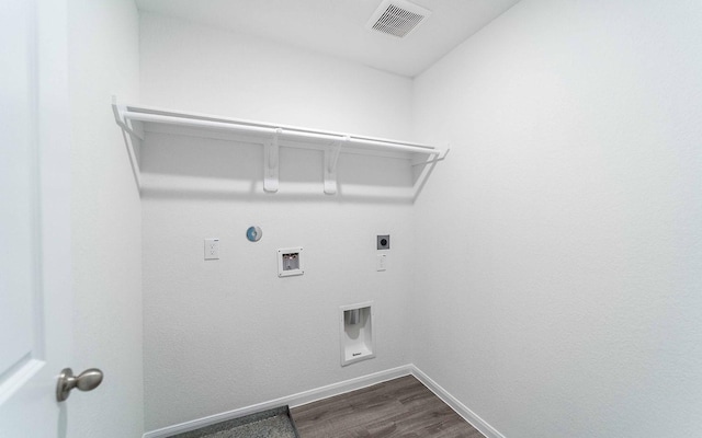 10775 Sora Dr, Willis, TX 77378 - laundry room featuring laundry area, washer hookup, hookup for an electric dryer, visible vents, and baseboards
