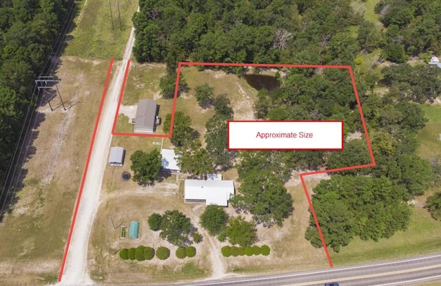 81 Fm 3454th Rd, Huntsville, TX 77320 - aerial view of property and surrounding area featuring property boundaries highlighted