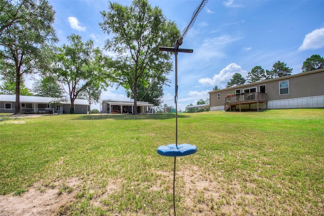 81 Fm 3454th Rd, Huntsville, TX 77320 - view of green lawn featuring a wooden deck