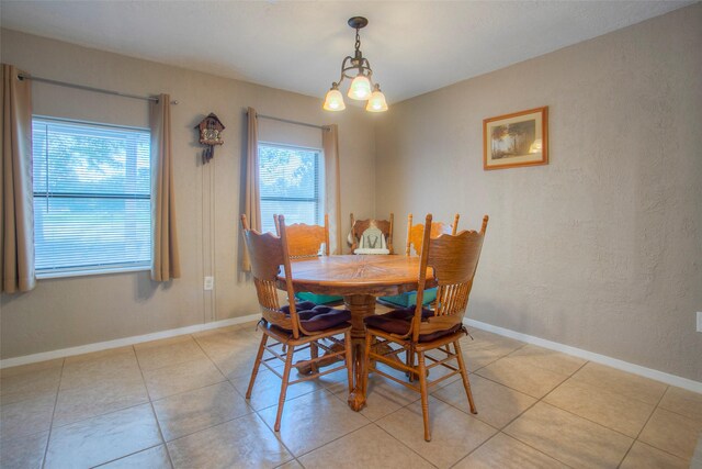 81 Fm 3454th Rd, Huntsville, TX 77320 - dining area with light tile patterned floors and baseboards