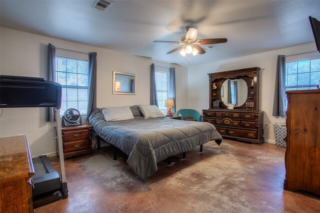 81 Fm 3454th Rd, Huntsville, TX 77320 - carpeted bedroom with multiple windows and a ceiling fan