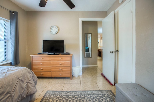 81 Fm 3454th Rd, Huntsville, TX 77320 - bedroom with light tile patterned flooring and a ceiling fan