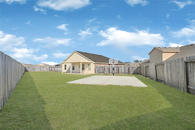 view of yard with a fenced backyard and a patio