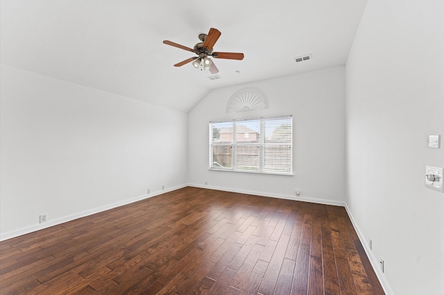 unfurnished room featuring lofted ceiling, dark hardwood / wood-style floors, and ceiling fan