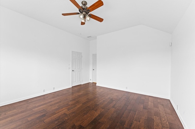 unfurnished room featuring lofted ceiling, dark hardwood / wood-style floors, and ceiling fan