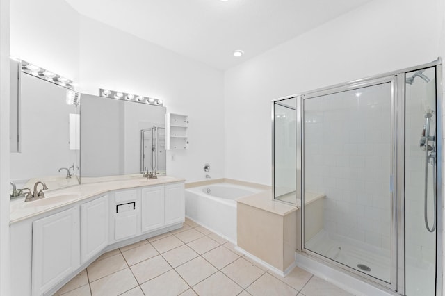 bathroom featuring vanity, tile patterned floors, and plus walk in shower