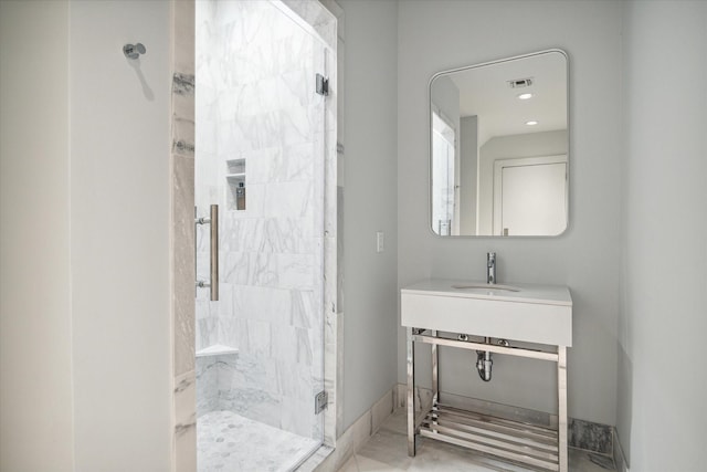 bathroom with vanity and an enclosed shower