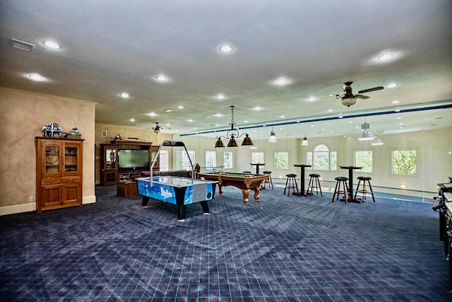 recreation room with billiards, ceiling fan, and dark colored carpet