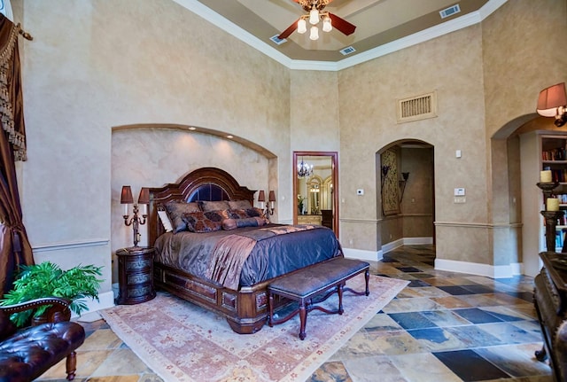 bedroom with crown molding and ceiling fan