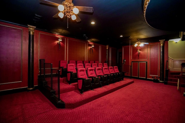 cinema room with dark carpet and ceiling fan