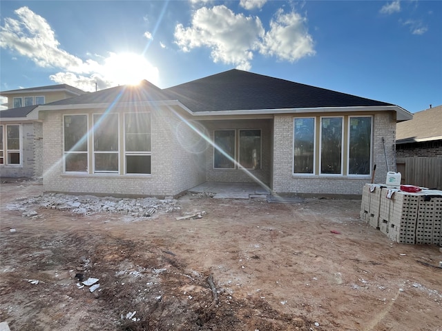 back of house featuring a patio area