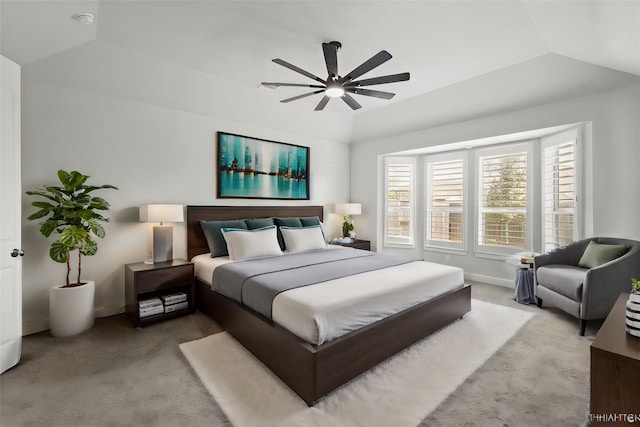 bedroom featuring lofted ceiling, carpet flooring, and ceiling fan