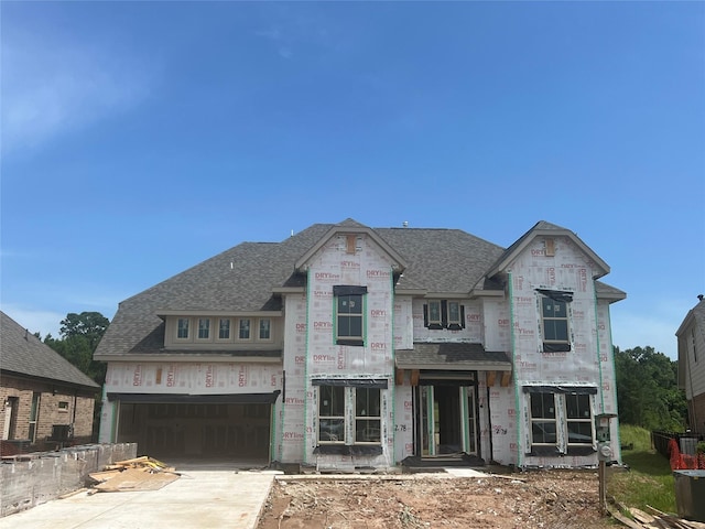 278 Peninsula Point Dr, Montgomery, TX 77356 - unfinished property with driveway, roof with shingles, and a garage