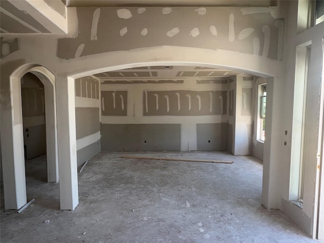 278 Peninsula Point Dr, Montgomery, TX 77356 - unfurnished living room with arched walkways