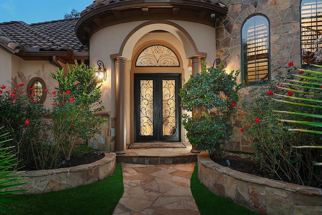 view of exterior entry with french doors