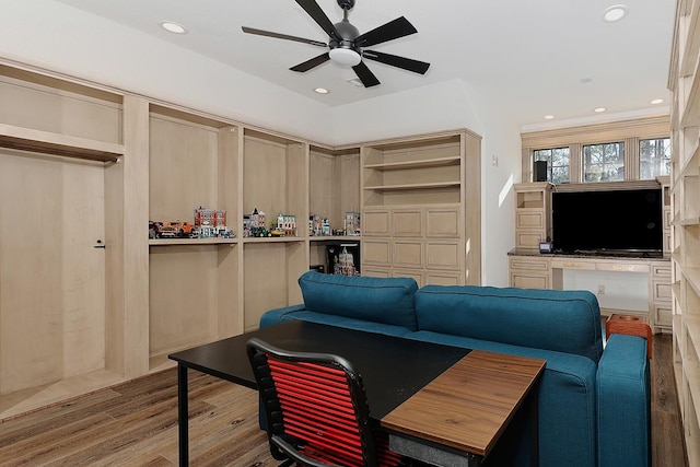 interior space featuring ceiling fan and light wood-type flooring