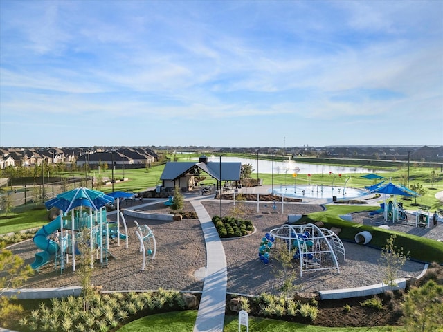 view of jungle gym featuring a water view